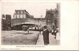 MA, SPRINGFIELD - Main St, Railroad Arch, trolly, people, Cooleys Hotel postcard