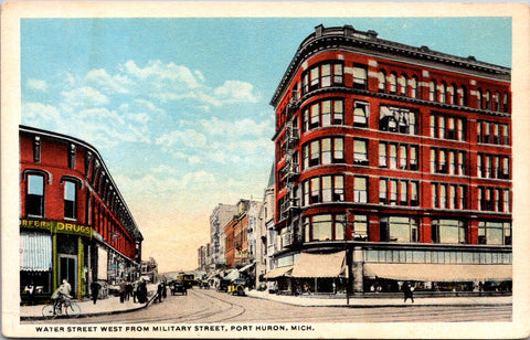 MI, Port Huron - Water St, Drug store on corner postcard - A12489
