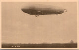 Zeppelin postcard - a flying zeppelin, but not identified close up - A19358