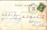 Valentine postcard - Cupid playing heart musical instrument - A19620
