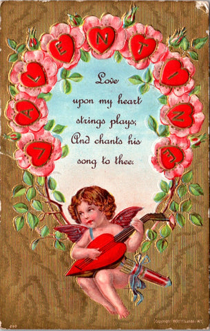Valentine postcard - Cupid playing heart musical instrument - A19620