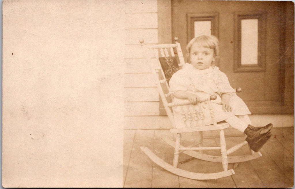 People - Child - in small rocking chair on a porch @1909 RPPC - B17227