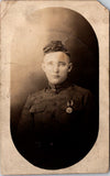 Military Man in uniform - has a medal on his breast pocket - RPPC -  B172
