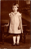 People - Girl - child standing in a plain dress, page boy hair cut RPPC - BP0009