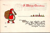 Xmas - Santa Claus walking to the town with his big, brown sack and a wreath pos