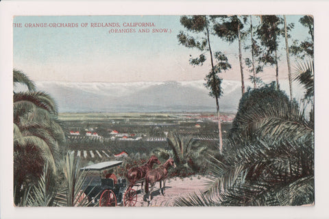 CA, REDLANDS - Orange Orchards, city below, buggy on road postcard - C06308