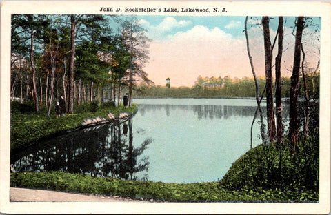 NJ, Lakewood - John D Rockefellers Lake, Man, woman, child on postcard - C17397