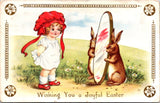 Easter - Young girl looking into a mirror held by two rabbits postcard - CP0800
