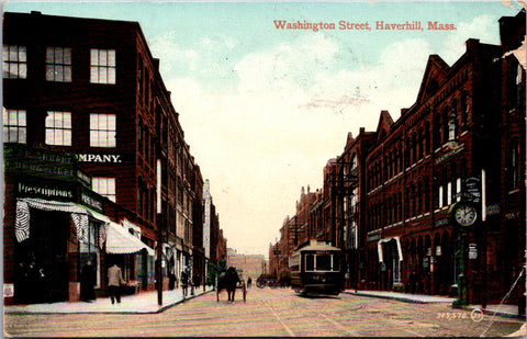 MA, HAVERHILL - Washington St, drug store, street clock etc postcard - D07063