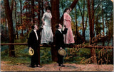 NY, EVANS MILLS - Lovers Lane - ladies on rail holding man's hand postcard - D17164