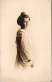 People - Female postcard - Pretty Young Woman side glance RPPC - DG0145