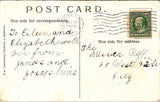 Xmas - Dreams of Santa Claus, 2 kids in bed, stockings hung on brass bed postcar