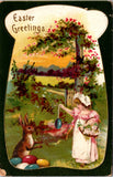 Easter - girl in long pink dress playing with rabbit postcard - E23172