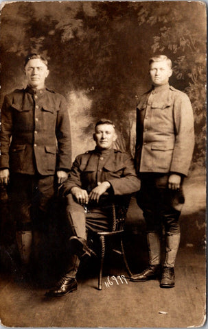 Military Men in uniform - one seated, 2 standing - RPPC - E23235