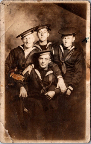 Military Men in uniform - USS Massachusetts on hat, 4 guys posing - RPPC