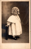 People - Child - dress, shawl, hat - ROBERTS studio RPPC - E23240