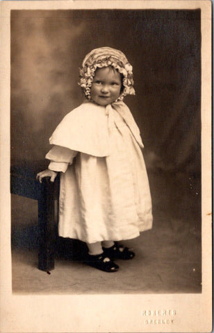 People - Child - dress, shawl, hat - ROBERTS studio RPPC - E23240