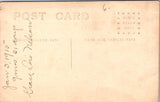 People - Child - standing on ornate chair in dress and boots - RPPC - E23243