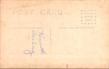 People - Child - sitting on mini stuffed chair with tacks - RPPC - E23245