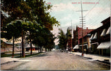PA, HONESDALE - Main St - Large hanging pocket watch - postcard - E23515