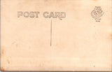 People - Child - standing on chair in white, muff, boots - studio RPPC - F09044