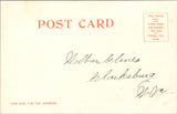 Ship Postcard - TASHNOO w/US Mail sign on rail, people, bldgs postcard - F17018