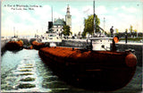 MI, SOO - Poe Lock, Tow of Whalebacks locking up, and bit of land postcard - F17