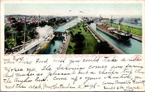 MI, Sault Ste Marie - Weitzel Lock and city beyond - Detroit Pub postcard - F173