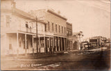OR, BURNS - Street scene including Stage Office, Burns Hotel - RPPC postcard - F23039