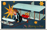 Plane postcard - Bi-plane, man kissing female face of star - F23080