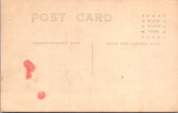 People - Children - posing, 1 in chair 1 standing in thigh boots - KNOX RPPC - NL0890