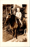 People - Boy - sitting up on a saddle on a small horse RPPC - NL0891