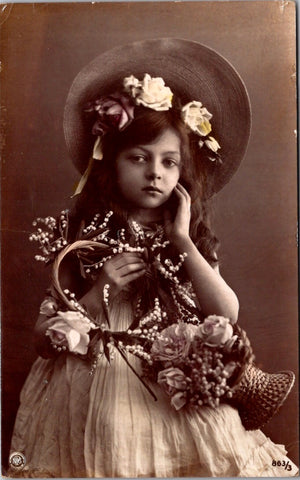 People - Girl - large hat, basket of flowers, hand to face - @1911 RPPC - NL0894