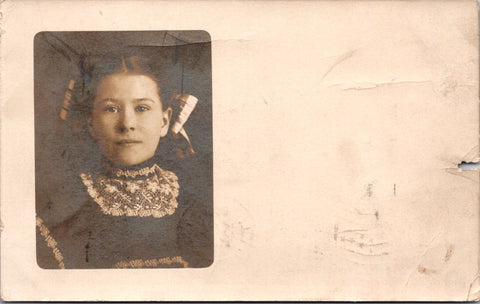 People - Girl - chest up view with lace around neck, hair in ribbon RPPC - NL0895