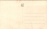 People - Girl - female child on a scooter in a studio RPPC - NL0896