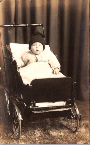 People - Child - Close up of a kid in an old baby carriage RPPC - NL0898