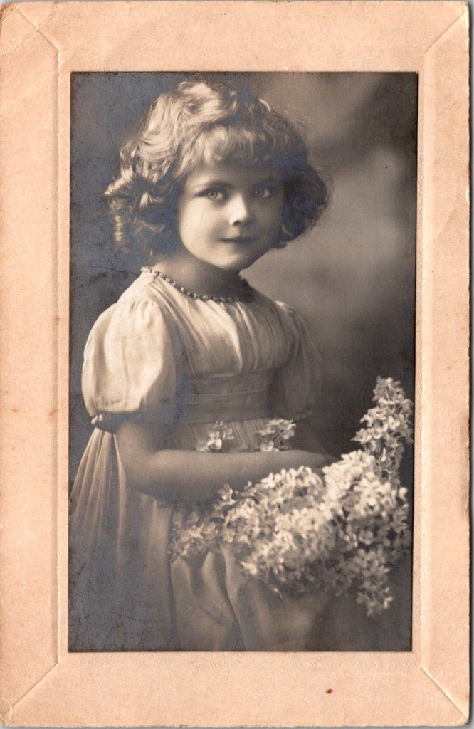 People - Girl - little lady holding flowers @1919? RPPC - W00397