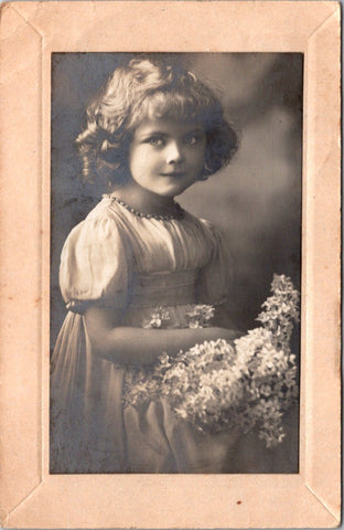 People - Girl - little lady holding flowers @1919? RPPC - W00397