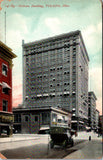 OH, Toledo - Nicholas Bldg, Pianos sign, soft top car, hydrant etc postcard - w01365