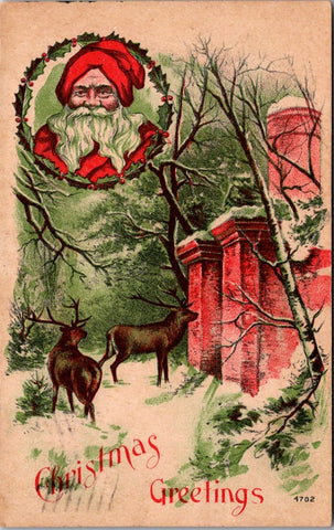 Xmas - Santa Claus in circle with 2 big male deer in scene postcard