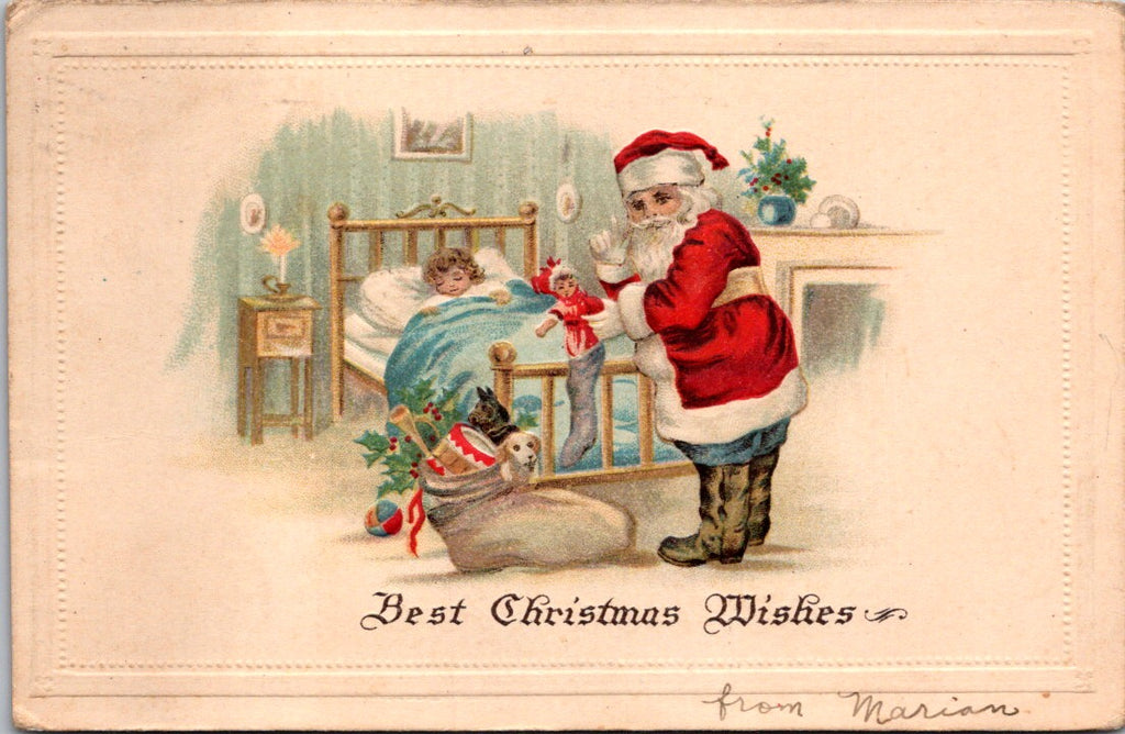 Xmas - Santa Claus at girls brass bed with his sack of toys postcard