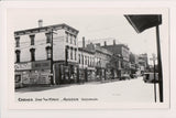 IN, AURORA - corner of 2nd & Main, barber pole, signs etc RPPC postcard - wk0254