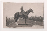Military - Army man in uniform on horse closeup - RPPC - 800861