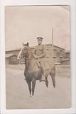 Military Man in uniform - posing on horse - RPPC - 800870