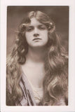 People - Female postcard - Young Woman RPPC w/seductive eyes, long hair - 800882