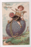 Easter - boy angel with wings sitting on large purple egg - A19046