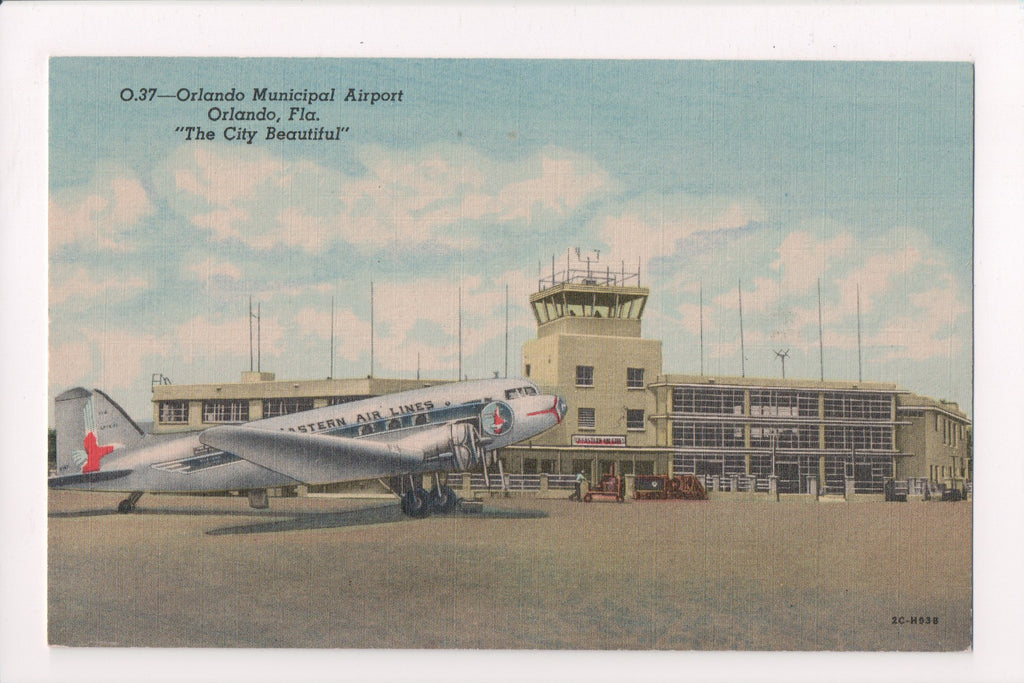 FL, ORLANDO - Municipal Airport postcard, Eastern Air Lines Plane - w00809