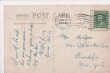 Easter postcard - Girl with hand on bunny rabbits eyes - B10113