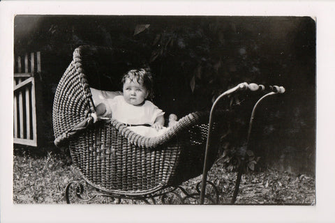 MISC - Baby - CHUBBY CHEEKED, Wicker stroller, close up RPPC - BP0046