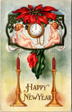 New Year - cherubs watching a clock strike 12 postcard - C08663